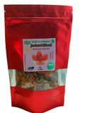 A red stand-up pouch of Ayur M Herbals Jerini Kalash Whole Spices, with a clear window showing the dried spices inside, set against a plain white background.