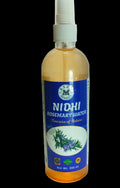 A 200 ml spray bottle of NIDHI Rosemary Water, featuring a blue label with rosemary illustrations and a white pump dispenser, set against a plain light background.