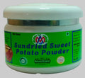A white plastic jar of Sundried Sweet Potato Powder with a bright green label, set against a plain white background.