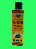 A 200 ml bottle of Ayur M Herbals Nidhi Herbal Hair Oil, featuring a yellow label with red text and a black cap, set against a plain white background.