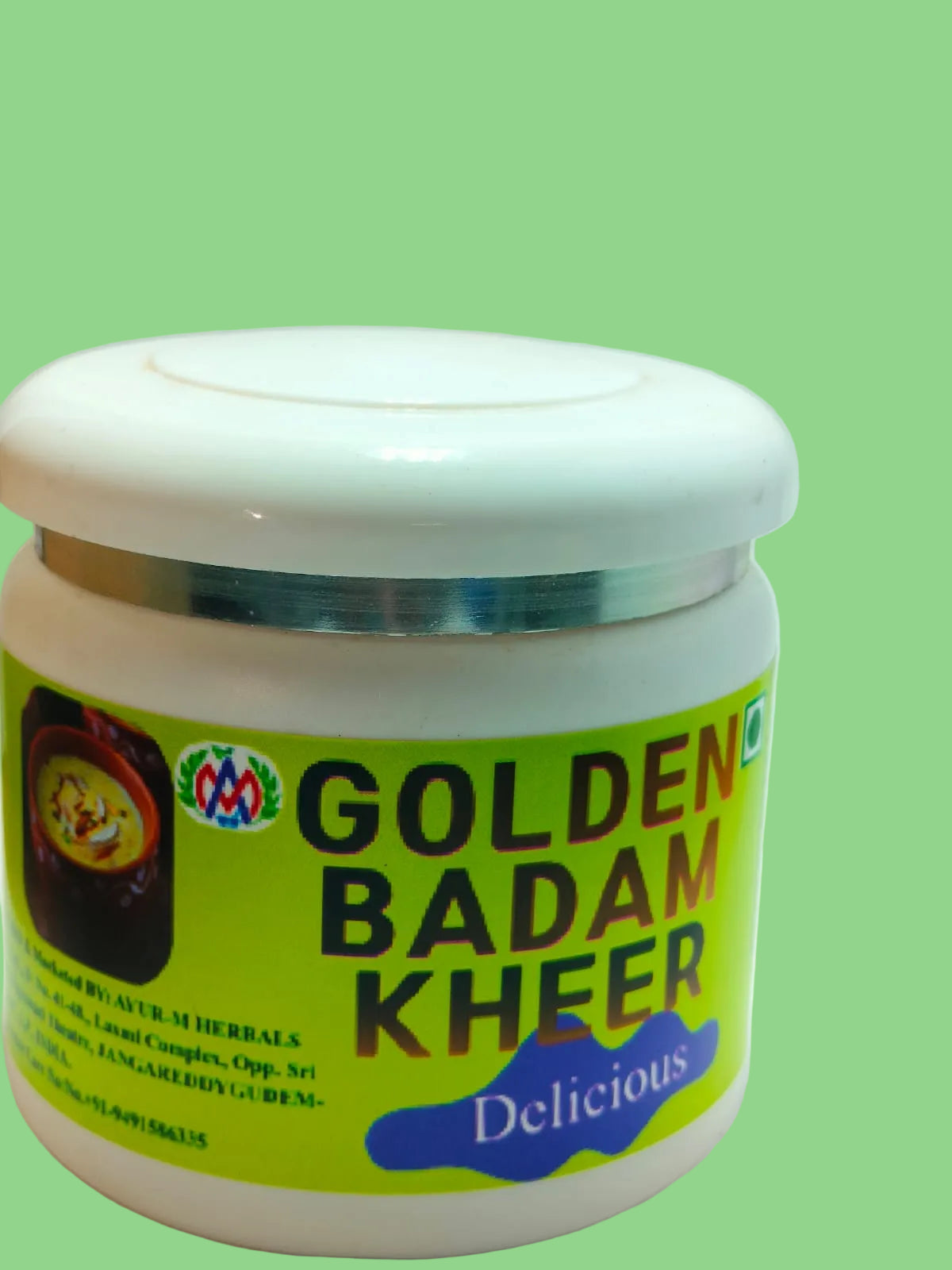 A white plastic jar of Golden Badam Kheer with a bright lime green label, photographed against a plain white background.